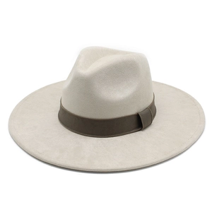 Detail of classic wide brim fedora hat with elegant dark brown ribbon decoration
