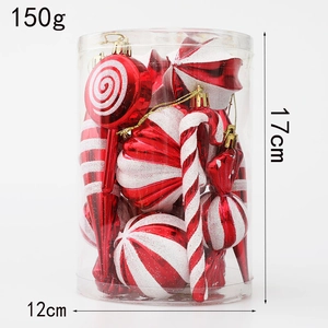 Set decorativo de caramelos navideños rojos y blancos en caja cilíndrica clara