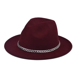 Detailed view of burgundy wool fedora hat with a decorative silver metal chain band