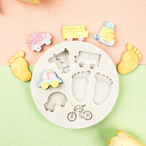 Silicone DIY mold with school bus and baby footprint shapes for fondant and soap