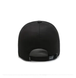 Rear view of black cotton baseball cap showing adjustable strap with embossed logo buckle