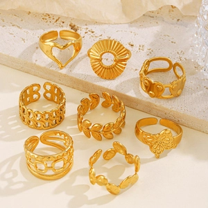 Set of 8 gold stainless steel open rings with heart, butterfly and leaf motifs