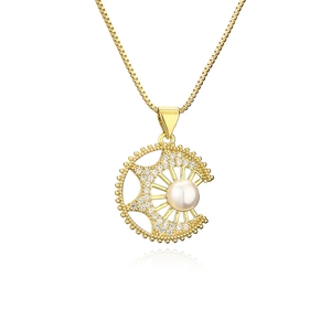 Elegant gold crescent moon necklace with pearl and sparkling zircon pendant on white background