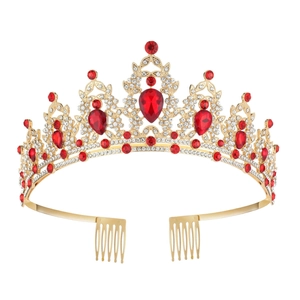 Detailed view of bridal crown featuring red teardrop crystals and gold alloy base