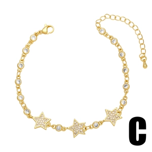 Golden luxury bracelet with micro-paved cubic zirconia stars and adjustable lobster clasp