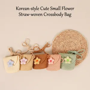 Handmade woven straw crossbody bags for kids in five cute colors with floral decor