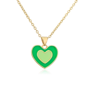 Close-up of dual-layer green enamel heart pendant with 18K gold plated chain