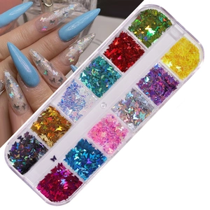 Detail of 12-color butterfly nail art sequins in a clear box showing laser holographic effects