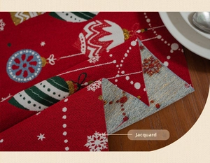 Detailed close-up of red Christmas table runner featuring jacquard snowflake patterns