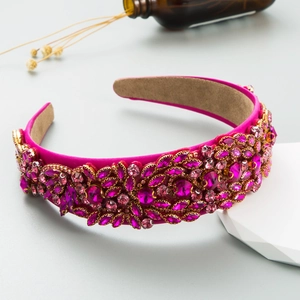 Detail of handmade Baroque velvet headband with pink and purple rhinestones