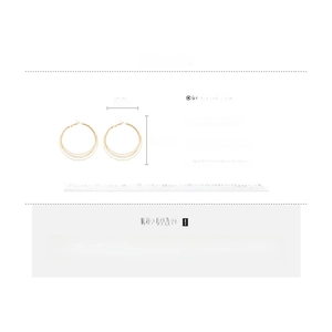Detail view of gold layered hoop earrings showing iron material and silver needle specs