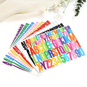 Macro shot of colorful waterproof vinyl alphabet and number stickers for DIY crafts