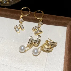 Elegant 14K gold plated earrings with H letter design, sparkling zircons and white pearls