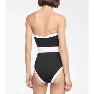 Classic black and white contrast strapless one-piece swimsuit shown from the back view
