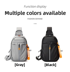 Detail view of water-resistant gray and black crossbody chest bags with orange strap accessories