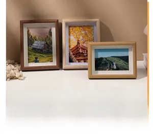 Three-piece solid wood photo frame set in various wood tones with white mat inserts