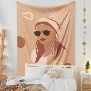 Detail of bohemian tapestry featuring abstract female silhouette on bedroom wall decoration