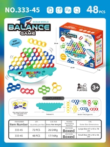 Marine balance game components including shark base, 48 colorful blocks, and 24 challenge cards