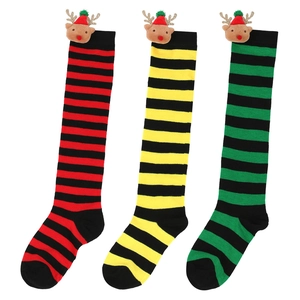 Three pairs of striped Christmas socks with cute 3D reindeer doll attachments