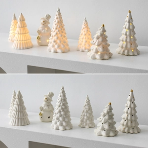 Mini ceramic white Christmas tree set with LED lights and golden accents for desk decor