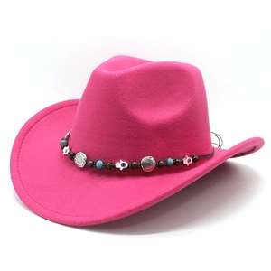 Western pink felt cowboy hat with ethnic beaded band and hand of Fatima charm detail