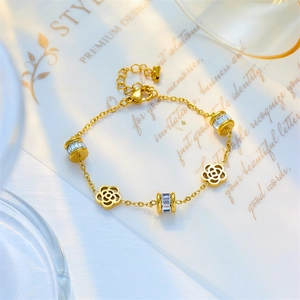 Minimalist gold flower chain bracelet with zircon charm elements and adjustable length