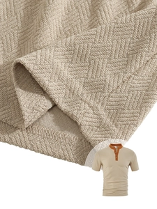 Detailed macro view of khaki textured knit fabric and stitching on men polo shirt