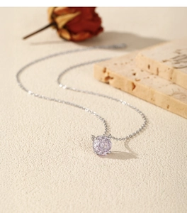 Close-up of S925 sterling silver necklace with lavender rose-cut zircon pendant