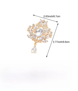 Detailed technical diagram showing 6.7cm by 9.6cm dimensions of the gold crystal brooch