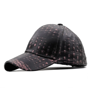 Faux leather baseball cap featuring industrial bronze metallic polka dots on black finish