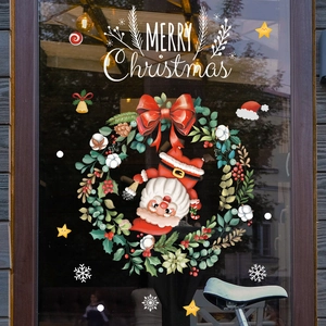 Christmas wreath window sticker with Santa Claus and Merry Christmas text on glass