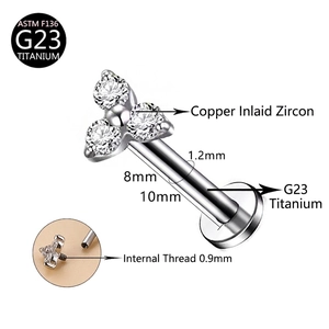 ASTM F136 G23 titanium lip stud with triple zircon clusters and internal threading