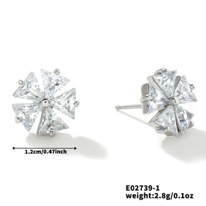 Detail showing 1.2cm silver flower stud earrings with cubic zirconia inlay for women