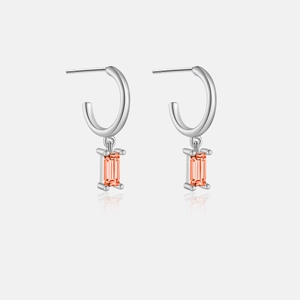 Detail view of S925 sterling silver drop earrings with orange rectangular gemstone