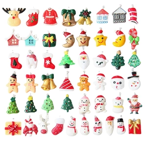 Set of 40 festive resin Christmas charms including Santa, reindeer, and trees for DIY crafts