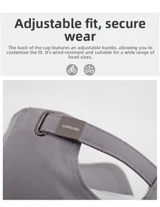 Detail of adjustable metal buckle and strap on the back of the cotton baseball cap