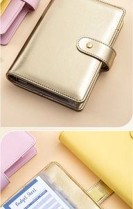 Detail of macaron gold PU leather binder with budget sheets and zipper pockets