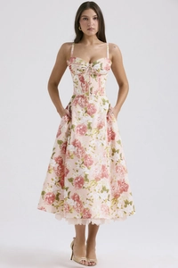 Detail of pink floral midi dress featuring lace trim hem and slim fit waist design