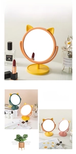 Detail of cute cat ear makeup mirror with 360 rotation and small jewelry tray base