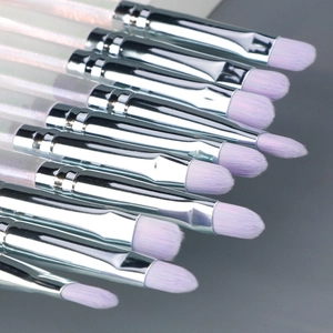 Set of lavender makeup brushes with transparent glitter handles and silver metal ferrule