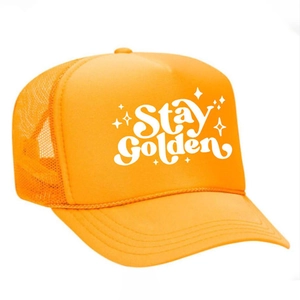 Orange Stay Golden trucker hat with breathable mesh and adjustable strap on white background