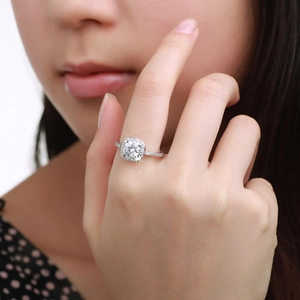Macro shot of a S925 sterling silver halo engagement ring with square diamond center