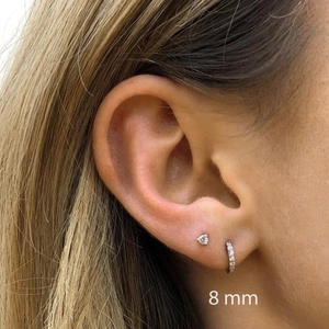 8mm silver hoop earrings with micro-pave zircons shown on model for size and style