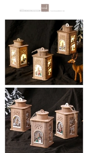 Close-up of wooden Christmas lantern with LED light and hollow laser-cut festive patterns