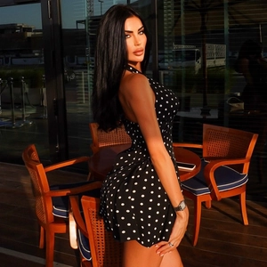 Polka dot halter neck dress with backless design and slim waist fit for summer