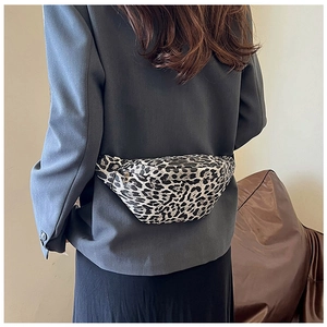 Detailed back view of a trendy leopard print chest bag worn over a grey blazer jacket