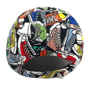 Detail of street style baseball cap featuring colorful graffiti shoe prints and metal buckle