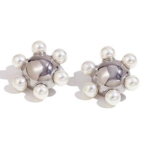 Silver metal spherical stud earrings with six radial white pearls on a white background