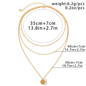 Size specifications for the layered gold necklace showing chain lengths and weight