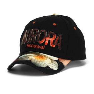 Detail of floral printed brim and 3D Aurora embroidery on a black cotton baseball cap